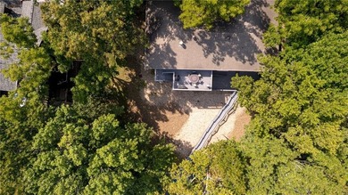 Lake Front Home w/ Private Dock! This 4-bedroom home features a on Bella Vista Country Club - Berksdale in Arkansas - for sale on GolfHomes.com, golf home, golf lot