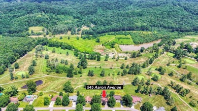 Fore! Welcome to 545 Aaron Avenue in Green Acres Subdivision on Fair Greens Country Club in Ohio - for sale on GolfHomes.com, golf home, golf lot