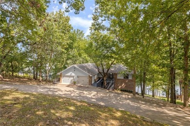 Lake Front Home w/ Private Dock! This 4-bedroom home features a on Bella Vista Country Club - Berksdale in Arkansas - for sale on GolfHomes.com, golf home, golf lot