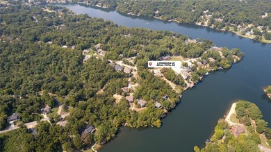 Lake Front Home w/ Private Dock! This 4-bedroom home features a on Bella Vista Country Club - Berksdale in Arkansas - for sale on GolfHomes.com, golf home, golf lot