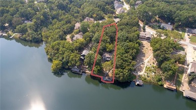 Lake Front Home w/ Private Dock! This 4-bedroom home features a on Bella Vista Country Club - Berksdale in Arkansas - for sale on GolfHomes.com, golf home, golf lot