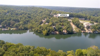 Lake Front Home w/ Private Dock! This 4-bedroom home features a on Bella Vista Country Club - Berksdale in Arkansas - for sale on GolfHomes.com, golf home, golf lot