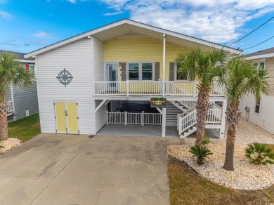 Paradise Palms is a stunning raised beach, channel house located on Beachwood Golf Club in South Carolina - for sale on GolfHomes.com, golf home, golf lot