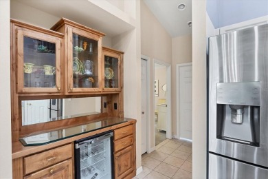 Nestled in the highly sought after gated community of Villas of on Sabal Trace Golf and Country Club in Florida - for sale on GolfHomes.com, golf home, golf lot