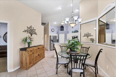 Nestled in the highly sought after gated community of Villas of on Sabal Trace Golf and Country Club in Florida - for sale on GolfHomes.com, golf home, golf lot