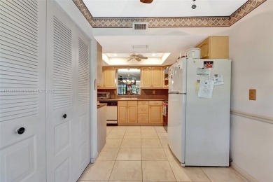 Tucked away in a desirable 55+ community in Margate, this on Oriole Golf and Tennis Club in Florida - for sale on GolfHomes.com, golf home, golf lot