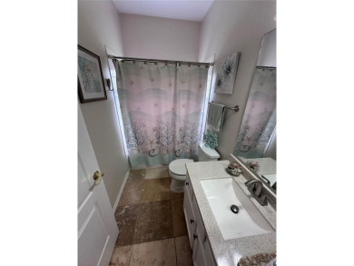 Coastal charm meets convenience in this beautifully kept on University Park Country Club in Florida - for sale on GolfHomes.com, golf home, golf lot