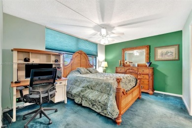 Tucked away in a desirable 55+ community in Margate, this on Oriole Golf and Tennis Club in Florida - for sale on GolfHomes.com, golf home, golf lot