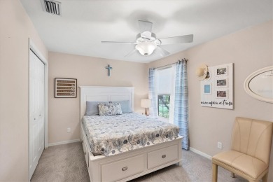 Nestled in the highly sought after gated community of Villas of on Sabal Trace Golf and Country Club in Florida - for sale on GolfHomes.com, golf home, golf lot