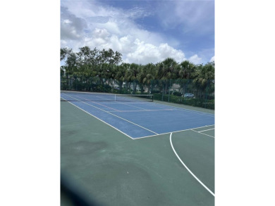 Coastal charm meets convenience in this beautifully kept on University Park Country Club in Florida - for sale on GolfHomes.com, golf home, golf lot