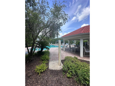 Coastal charm meets convenience in this beautifully kept on University Park Country Club in Florida - for sale on GolfHomes.com, golf home, golf lot