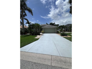 Coastal charm meets convenience in this beautifully kept on University Park Country Club in Florida - for sale on GolfHomes.com, golf home, golf lot
