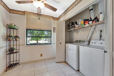 Tucked away in a desirable 55+ community in Margate, this on Oriole Golf and Tennis Club in Florida - for sale on GolfHomes.com, golf home, golf lot