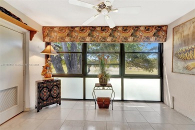 Tucked away in a desirable 55+ community in Margate, this on Oriole Golf and Tennis Club in Florida - for sale on GolfHomes.com, golf home, golf lot