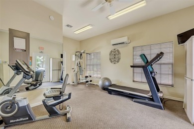 Nestled in the highly sought after gated community of Villas of on Sabal Trace Golf and Country Club in Florida - for sale on GolfHomes.com, golf home, golf lot