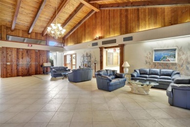 Tucked away in a desirable 55+ community in Margate, this on Oriole Golf and Tennis Club in Florida - for sale on GolfHomes.com, golf home, golf lot