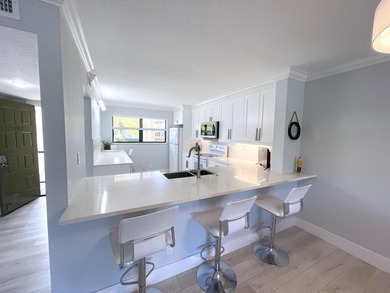 Completely Renovated 1ST Floor Unit at Eastpointe Country Club! on Eastpointe Country Club in Florida - for sale on GolfHomes.com, golf home, golf lot