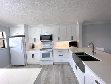 Completely Renovated 1ST Floor Unit at Eastpointe Country Club! on Eastpointe Country Club in Florida - for sale on GolfHomes.com, golf home, golf lot