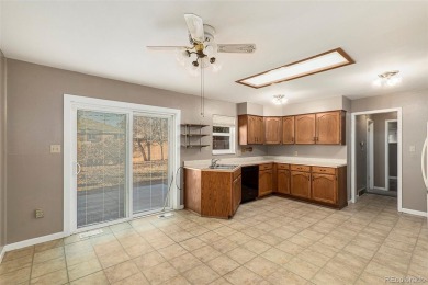 This brick ranch home offers a wonderful opportunity to update on Aurora Hills Golf Course in Colorado - for sale on GolfHomes.com, golf home, golf lot