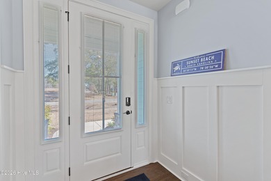 Welcome to coastal living at its finest in the master-planned on Sea Trail Golf Resort in North Carolina - for sale on GolfHomes.com, golf home, golf lot