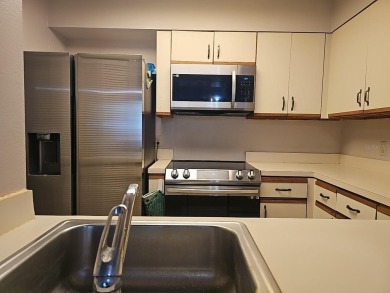 The Crystal Bay Condo is located in in the heart of Feather on Feather Sound Country Club in Florida - for sale on GolfHomes.com, golf home, golf lot