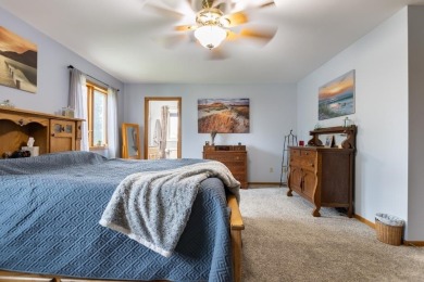 This is a home that checks all the boxes. Inside is a large well on Merrill Golf Club in Wisconsin - for sale on GolfHomes.com, golf home, golf lot