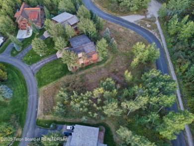 Welcome to the epitome of serene living where luxury meets on Teton Springs Resort and Club in Idaho - for sale on GolfHomes.com, golf home, golf lot