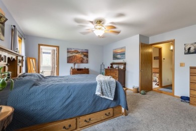 This is a home that checks all the boxes. Inside is a large well on Merrill Golf Club in Wisconsin - for sale on GolfHomes.com, golf home, golf lot
