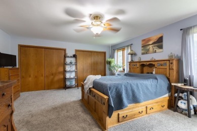 This is a home that checks all the boxes. Inside is a large well on Merrill Golf Club in Wisconsin - for sale on GolfHomes.com, golf home, golf lot