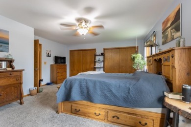 This is a home that checks all the boxes. Inside is a large well on Merrill Golf Club in Wisconsin - for sale on GolfHomes.com, golf home, golf lot