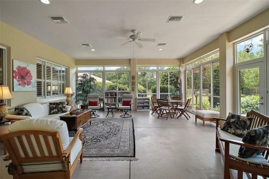 This pristine, expanded Hampton shows pride in ownership at on Eagle Ridge At Spruce Creek Country Club in Florida - for sale on GolfHomes.com, golf home, golf lot