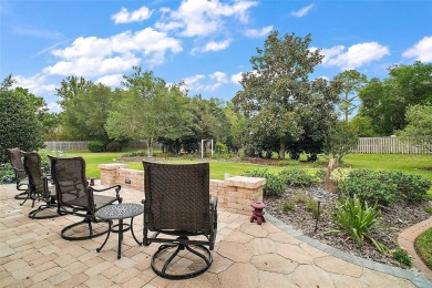 This pristine, expanded Hampton shows pride in ownership at on Eagle Ridge At Spruce Creek Country Club in Florida - for sale on GolfHomes.com, golf home, golf lot