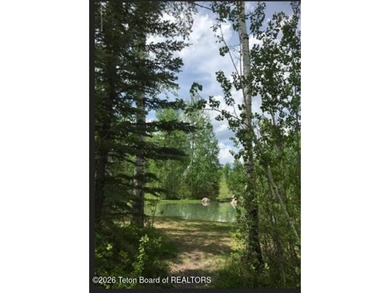 Welcome to the epitome of serene living where luxury meets on Teton Springs Resort and Club in Idaho - for sale on GolfHomes.com, golf home, golf lot