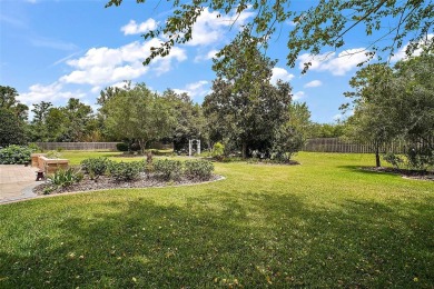 This pristine, expanded Hampton shows pride in ownership at on Eagle Ridge At Spruce Creek Country Club in Florida - for sale on GolfHomes.com, golf home, golf lot
