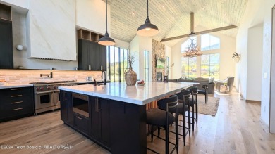 The stunning architecture of this newly constructed ultimate on Teton Springs Resort and Club in Idaho - for sale on GolfHomes.com, golf home, golf lot