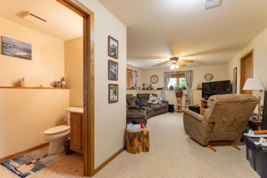 This is a home that checks all the boxes. Inside is a large well on Merrill Golf Club in Wisconsin - for sale on GolfHomes.com, golf home, golf lot