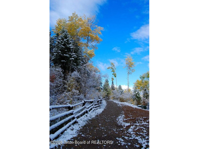 Welcome to the epitome of serene living where luxury meets on Teton Springs Resort and Club in Idaho - for sale on GolfHomes.com, golf home, golf lot