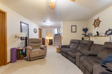 This is a home that checks all the boxes. Inside is a large well on Merrill Golf Club in Wisconsin - for sale on GolfHomes.com, golf home, golf lot