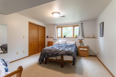 This is a home that checks all the boxes. Inside is a large well on Merrill Golf Club in Wisconsin - for sale on GolfHomes.com, golf home, golf lot