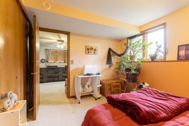 This is a home that checks all the boxes. Inside is a large well on Merrill Golf Club in Wisconsin - for sale on GolfHomes.com, golf home, golf lot