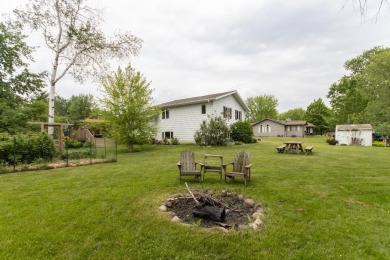 This is a home that checks all the boxes. Inside is a large well on Merrill Golf Club in Wisconsin - for sale on GolfHomes.com, golf home, golf lot