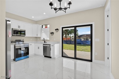 Brand-new construction, this 4-bed, 2-bath residence with a on River Hall Country Club in Florida - for sale on GolfHomes.com, golf home, golf lot