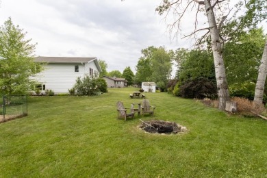 This is a home that checks all the boxes. Inside is a large well on Merrill Golf Club in Wisconsin - for sale on GolfHomes.com, golf home, golf lot