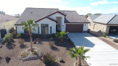 What a spectacular pool home, Open Floor plan that features a on Desert Lakes Golf Course in Arizona - for sale on GolfHomes.com, golf home, golf lot