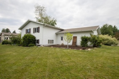 This is a home that checks all the boxes. Inside is a large well on Merrill Golf Club in Wisconsin - for sale on GolfHomes.com, golf home, golf lot