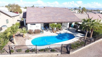 What a spectacular pool home, Open Floor plan that features a on Desert Lakes Golf Course in Arizona - for sale on GolfHomes.com, golf home, golf lot