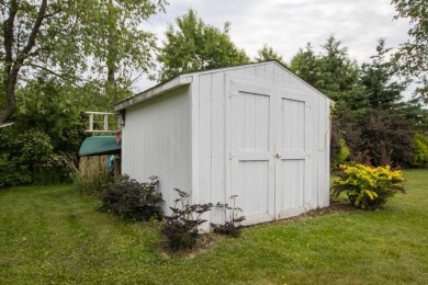 This is a home that checks all the boxes. Inside is a large well on Merrill Golf Club in Wisconsin - for sale on GolfHomes.com, golf home, golf lot