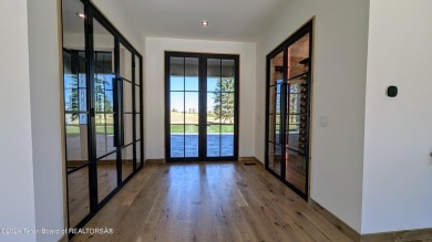 The stunning architecture of this newly constructed ultimate on Teton Springs Resort and Club in Idaho - for sale on GolfHomes.com, golf home, golf lot