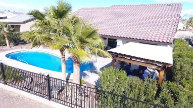 What a spectacular pool home, Open Floor plan that features a on Desert Lakes Golf Course in Arizona - for sale on GolfHomes.com, golf home, golf lot