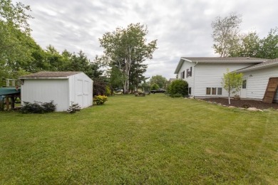 This is a home that checks all the boxes. Inside is a large well on Merrill Golf Club in Wisconsin - for sale on GolfHomes.com, golf home, golf lot